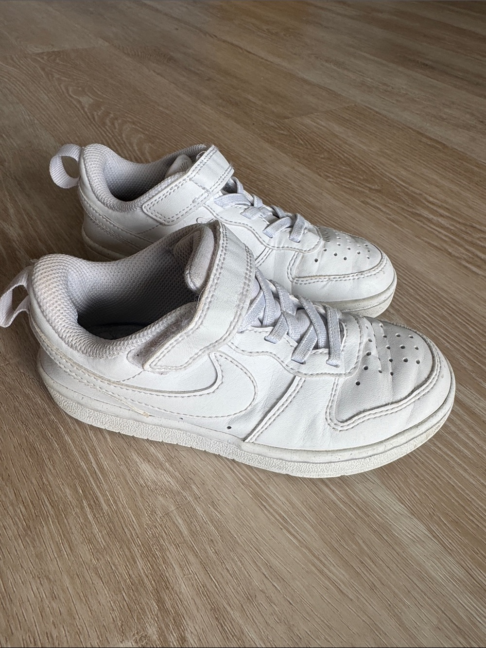 White kids nike sneakers